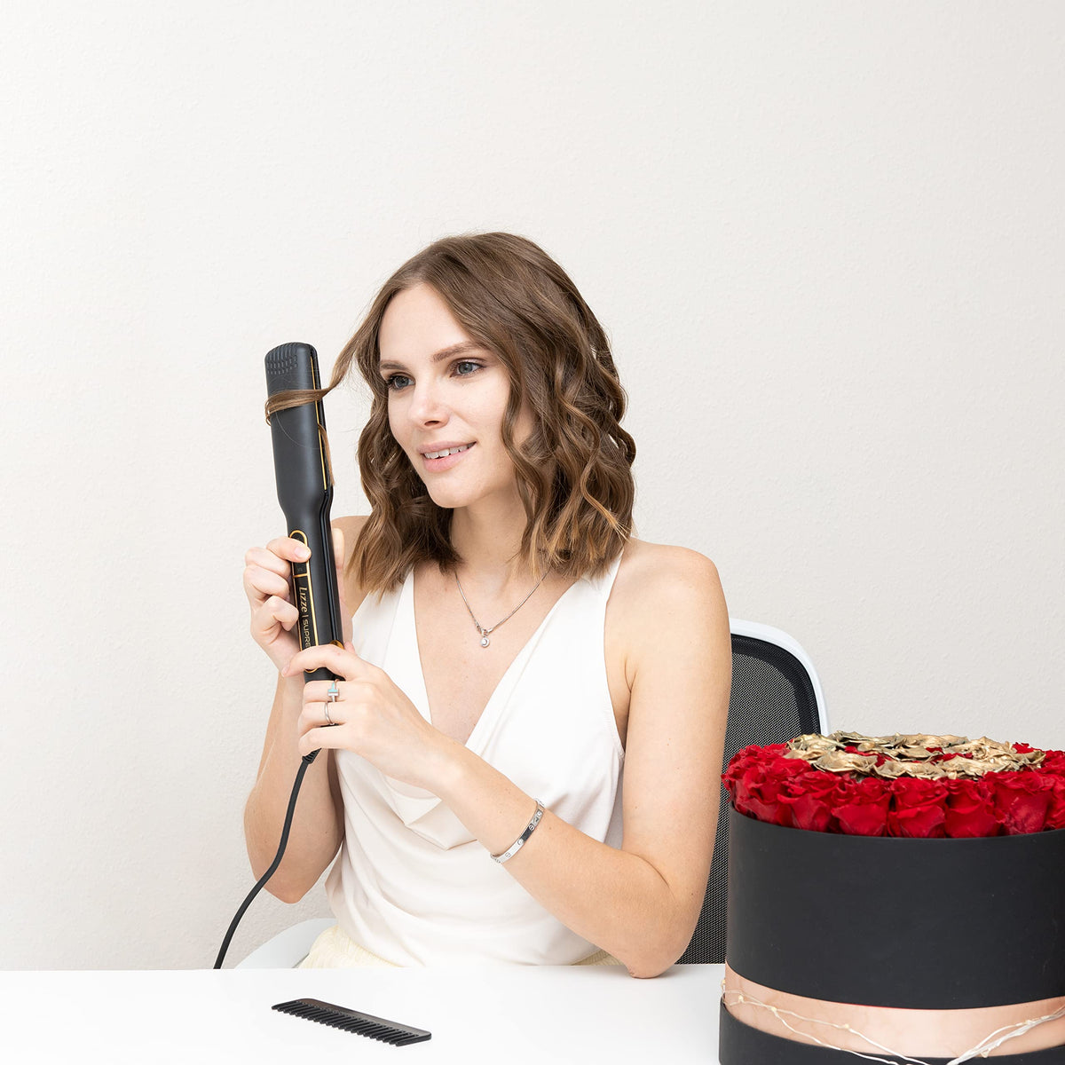 Lizze Supreme 1.5 Pro flat iron demonstrates frizz control results.