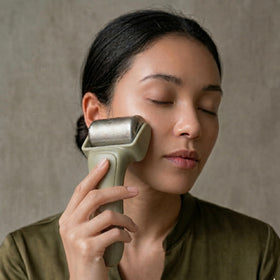 LOA SKIN ice roller on the body for soothing, refreshed skin.