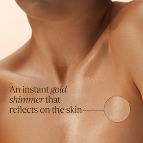 L'OCCITANE almond shimmering body oil under light emphasizes shimmering glow.