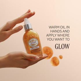 L'OCCITANE almond shimmering body oil texture close-up reveals silky, lightweight finish.