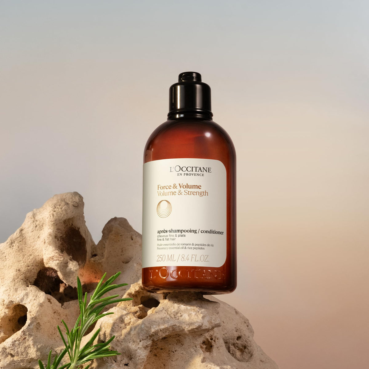 Pouring action of the conditioner showing smooth texture for detangling.