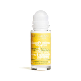 Close-up of the deodorant roll-on highlighting essential oils in a sleek bottle.