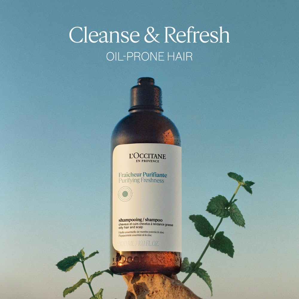 Foam from L'Occitane Aromachologie Purifying Freshness Shampoo for a refreshing cleanse