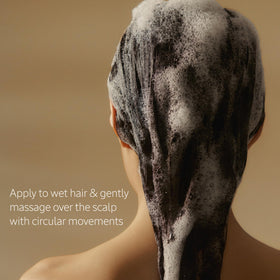 L'OCCITANE Aromachologie hair close-up displays thicker strands and fuller look
