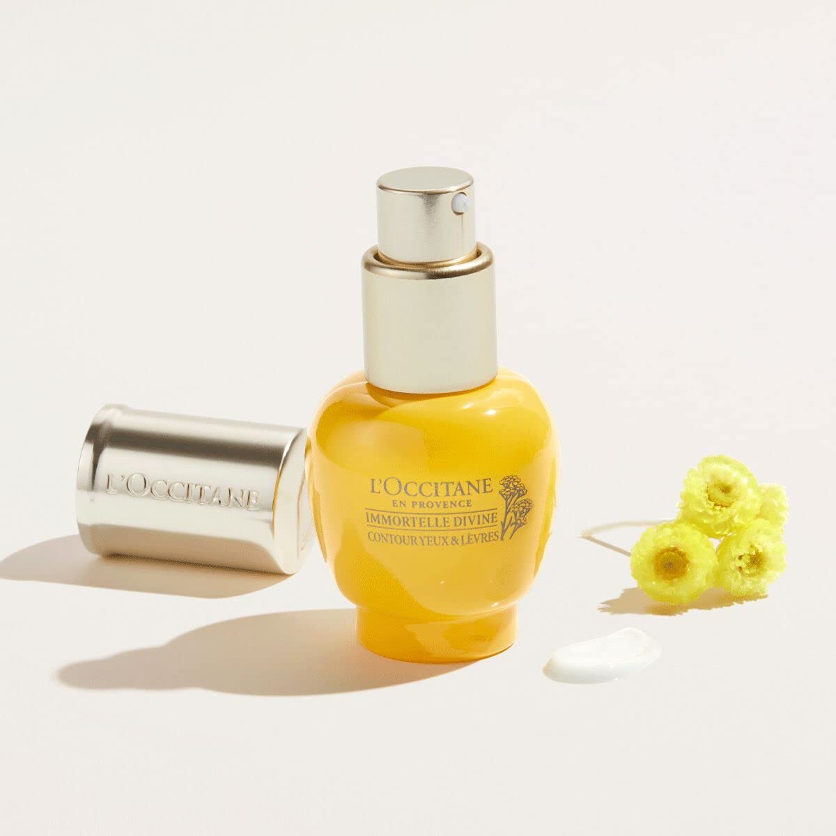 Close-up of Divine Eye Cream texture shows a rich, soothing formula.