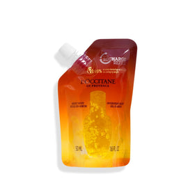 L'Occitane Immortelle Overnight Reset bottle close shows premium packaging and glow potential.
