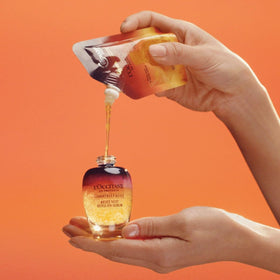 L'Occitane Immortelle Overnight Reset oil-serum pump-action demonstrates convenient use.