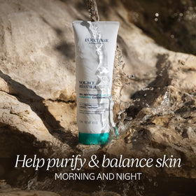 L'Occitane Purifying Cleansing Gel tube close-up highlights gentle cleanse and mineral-rich hydration.