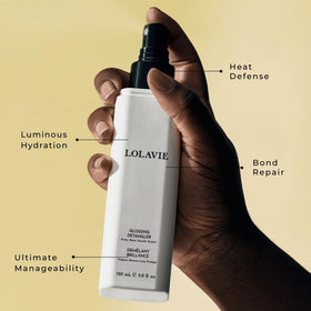 LolaVie Glossing Detangler spray on wet hair for easy detangling and manageability.