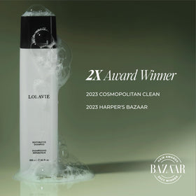 LolaVie Restorative Shampoo helps reduce frizz for smoother styling.