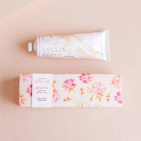 LOLLIA Breath Handcreme being massaged into hands for quick absorption.