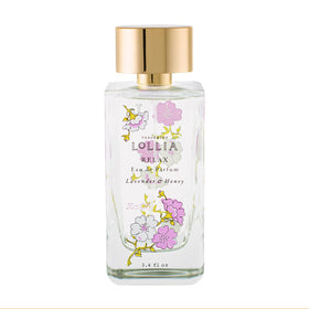 LOLLIA Relax bottle with glass and blossoms adds a calming vanity accent.