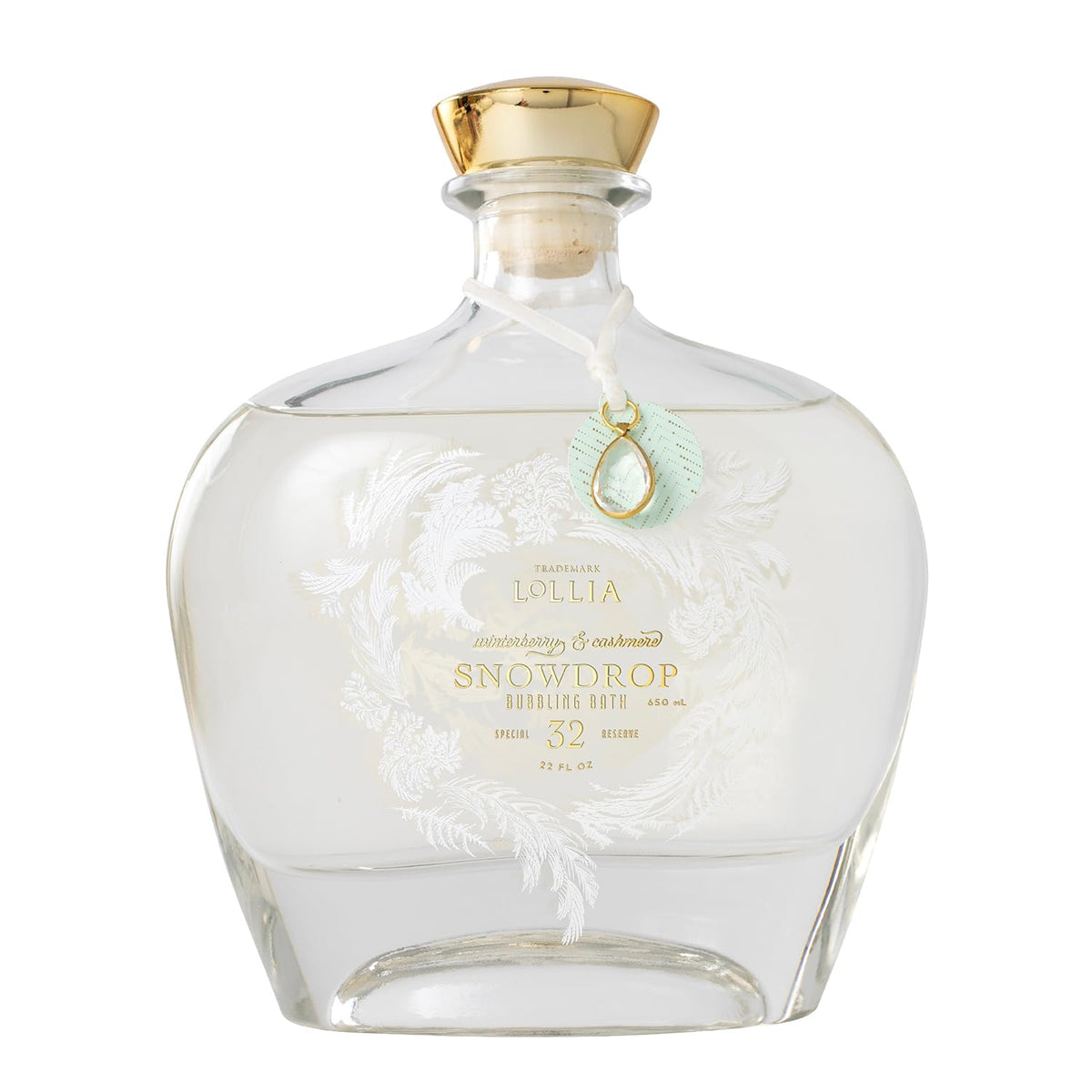 Lollia Snowdrop bubble bath bottle with frosted glass for a luxurious bath centerpiece.