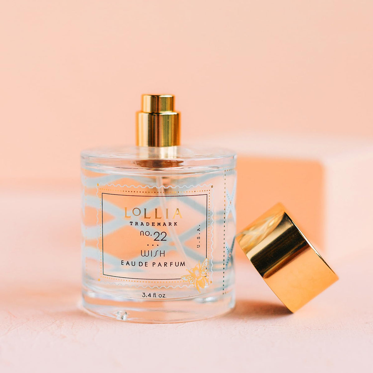 LOLLIA Wish bottle closeup cap emphasizes premium glass and refined craftsmanship.