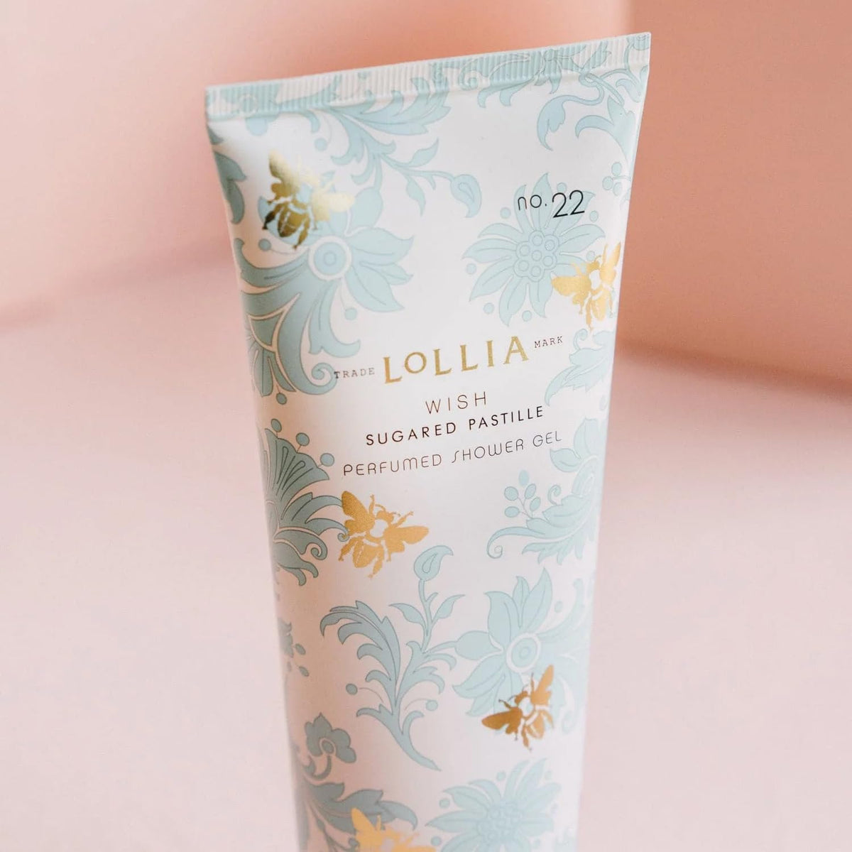 LOLLIA Wish Shower Gel rich lather highlighting Shea Moisture blend for a pampering cleanse.