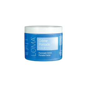 Loma Creme Pomade jar closeup showing creamy texture for medium hold and shine.