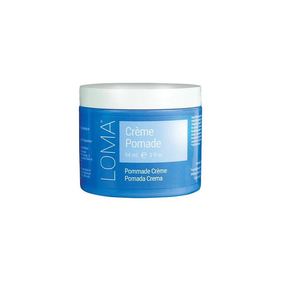 Loma Creme Pomade jar closeup showing creamy texture for medium hold and shine.