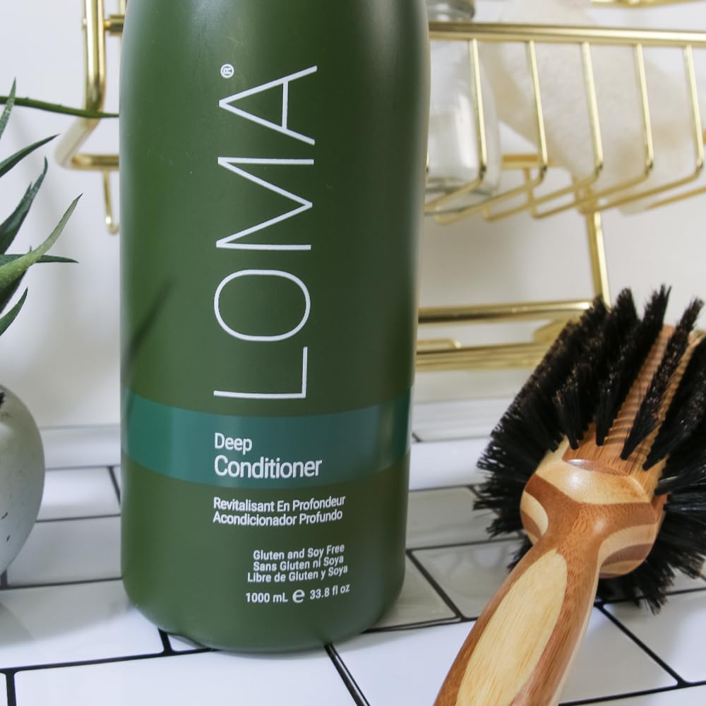 Loma Deep Conditioner being applied to damp hair for texture and shine