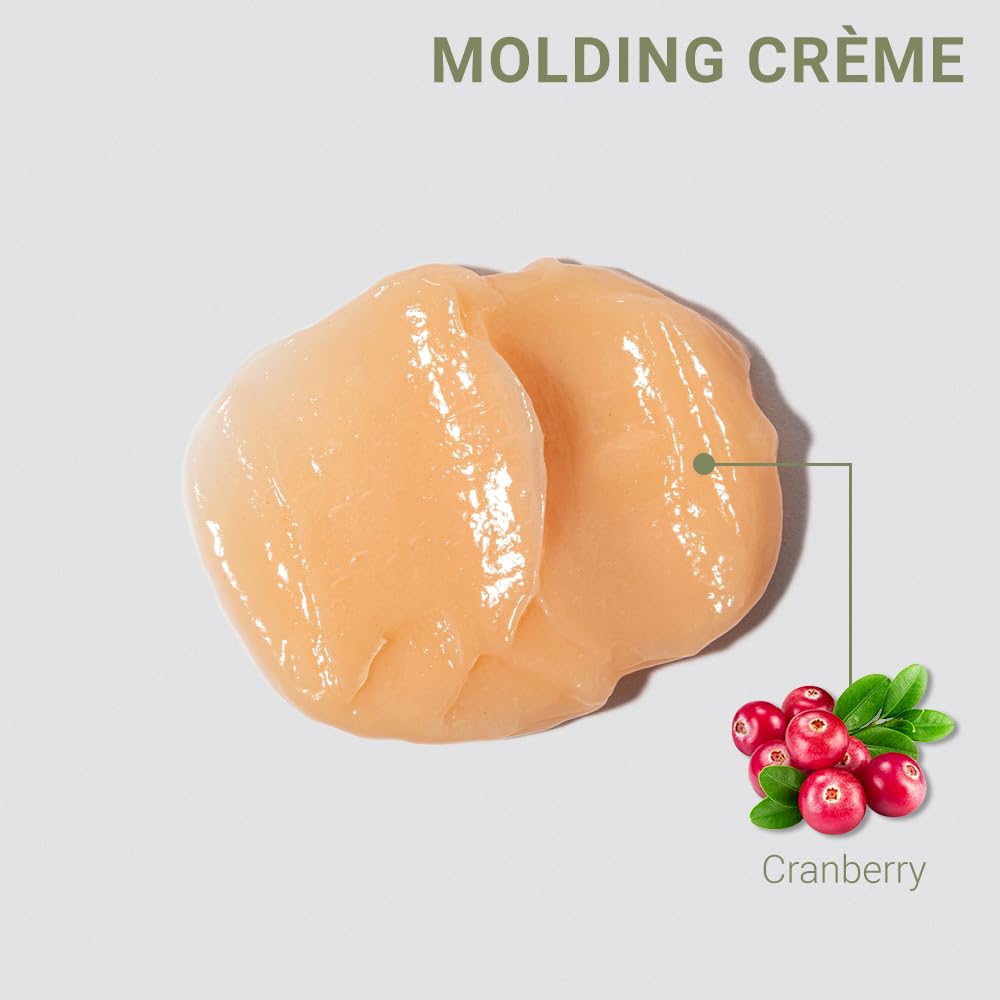 Loma Molding Crème applied to damp curls to build volume and shine.