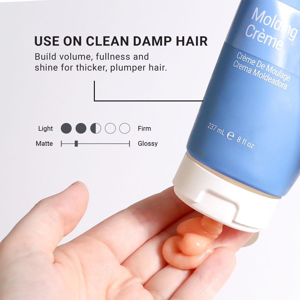 Close-up of Loma Molding Crème texture on hair for definition and separation.