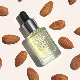 Londontown Cuticle Oil application to nail edges for quick hydration.
