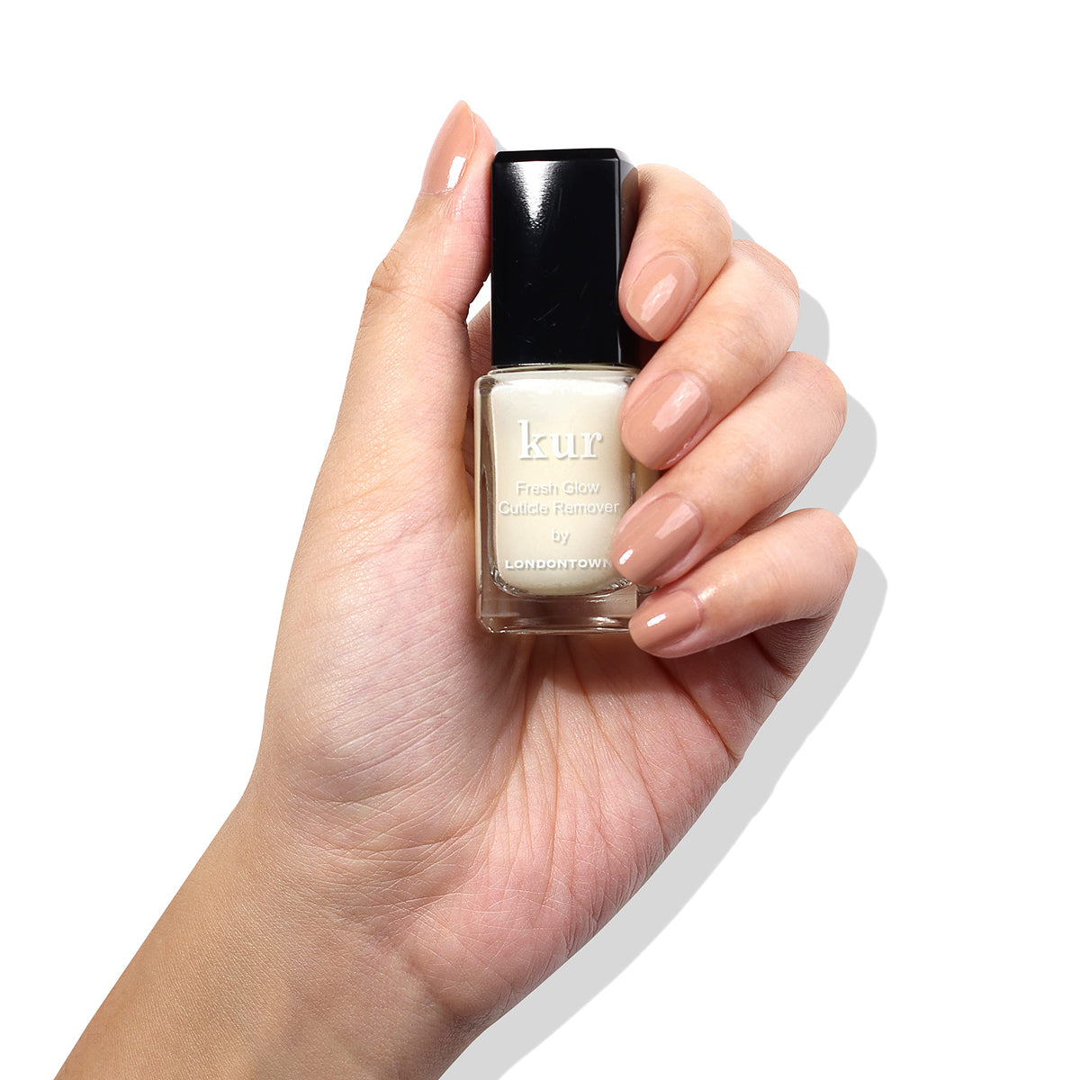 Londontown Cuticle Remover application shows gentle removal process.
