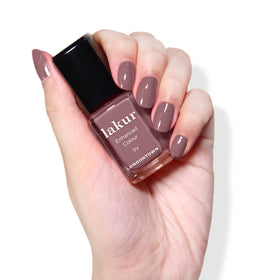 Bottle reflecting rich Dusty Pink gloss with gel-like shine