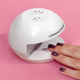 LONDONTOWN Flash Dry Nail Fan battery-powered operation for cordless mani-pedis.