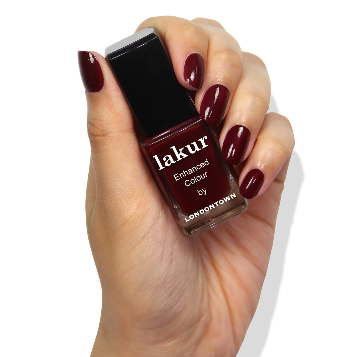 LONDONTOWN lakur nail application close up demonstrates streak free coverage.