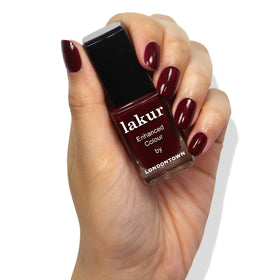 LONDONTOWN lakur nail application close up demonstrates streak free coverage.