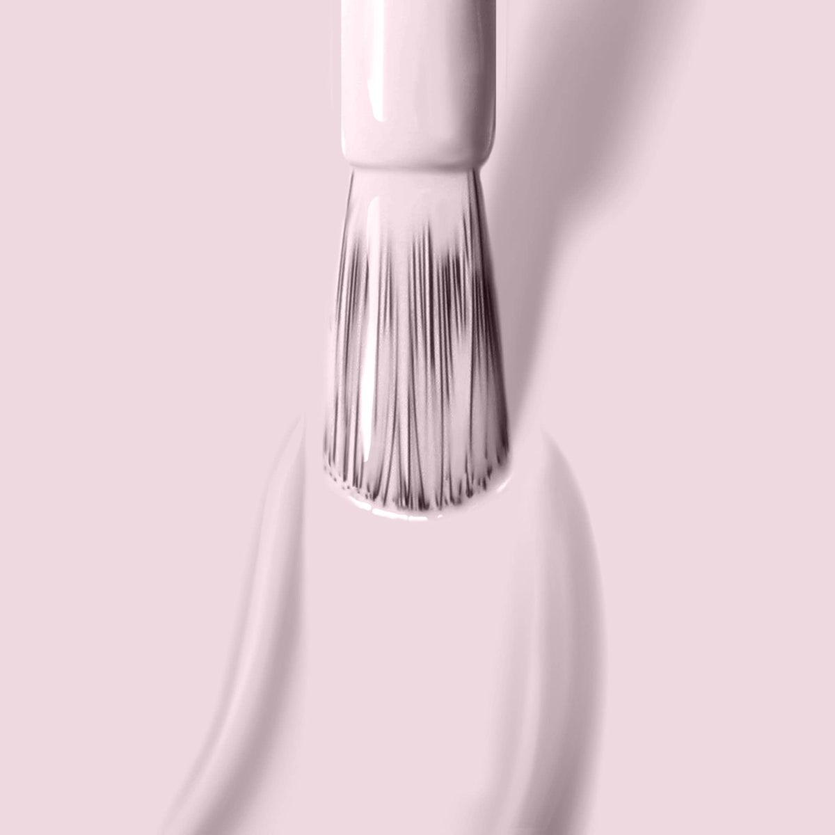 Close-up of Lakur brush shows smooth, precise application for salon-like results.