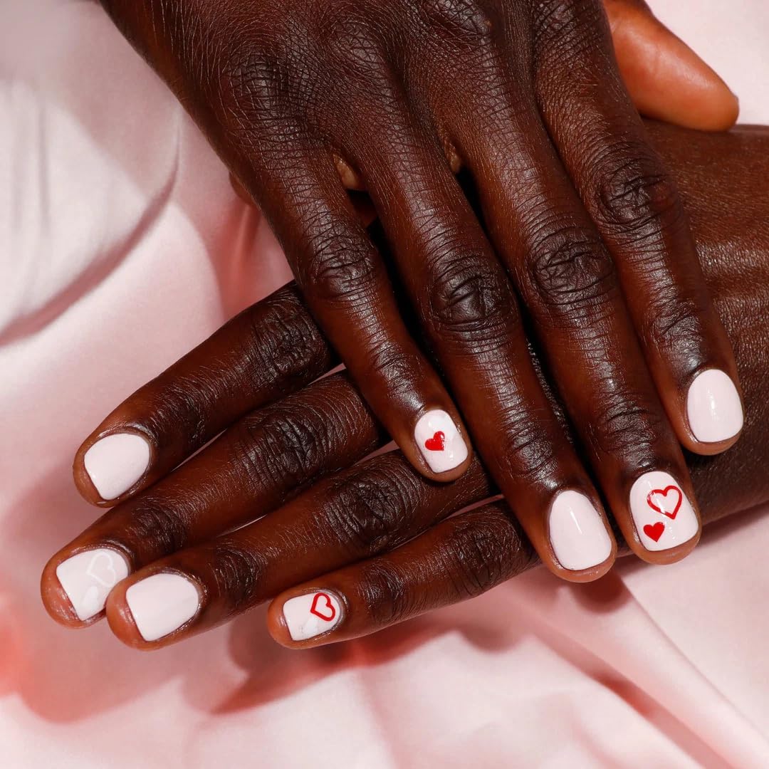 Nail hardener bond close-up reinforcing the natural nail surface.