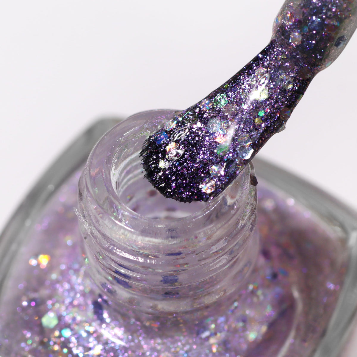 LONDONTOWN Lakur base coat and top coat pairing on nails.