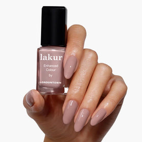 Swatch shows creamy nude-brown color ideal for everyday wear.