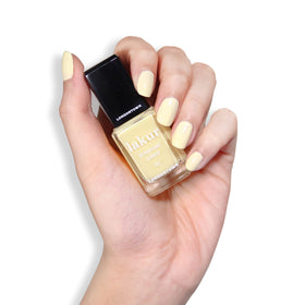 LONDONTOWN Lakur Buttercup swatch reveals rich orange-yellow pigment on nails