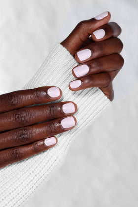 LONDONTOWN Lakur Ski Bunny pink on nails with glossy finish.