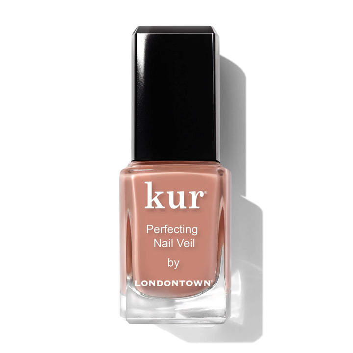 LONDONTOWN Nail Veil muted pumpkin tint provides a soft color on natural nails.