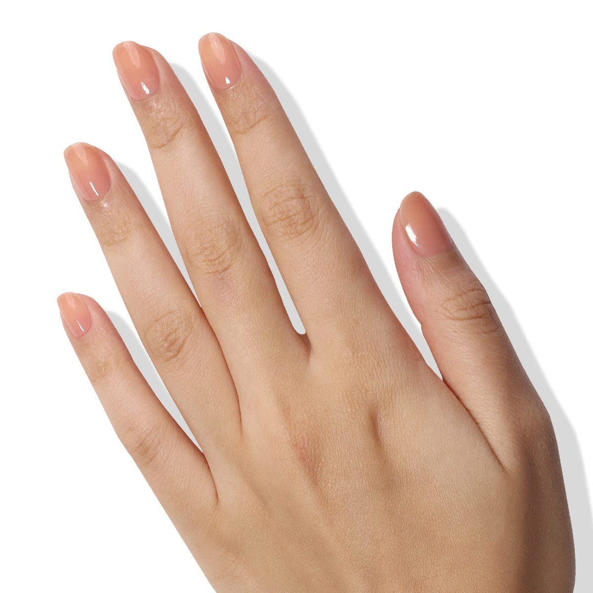 Before and after look highlighting natural nails with a sheer finish.