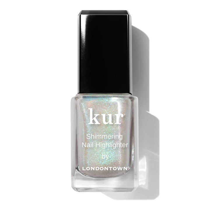 LONDONTOWN Shimmer Nail Highlighter bottle shows iridescent opal glow for radiant nails