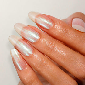 LONDONTOWN Shimmer Nail Highlighter swatch on nail reveals multi-dimensional color