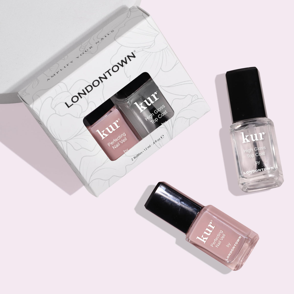LONDONTOWN High Gloss Top Coat over Nail Veil for a durable, gel-like shine.