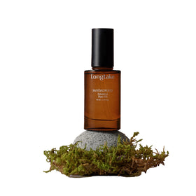 LONGTAKE Sandalwood Hair Fragrance Oil bottle for smooth, protected hair.