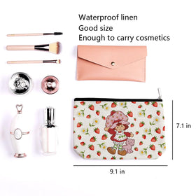 LongXIN Strawberry bag side angle demonstrates spacious interior for makeup and brushes.