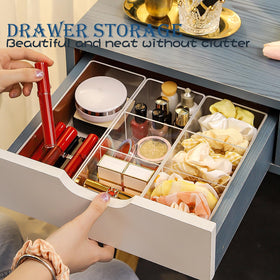 Bright clear acrylic tray enhances a tidy, appealing vanity display.