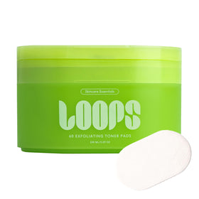 LOOPS Exfoliating Toner bottle close-up, pre-soaked pads for gentle exfoliation.