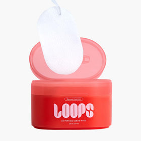 LOOPS peptide serum application on face and neck for even coverage.