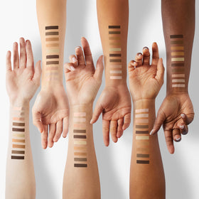 LORAC Unzipped Gold Uninhibited shimmer swatch with luminous finish.
