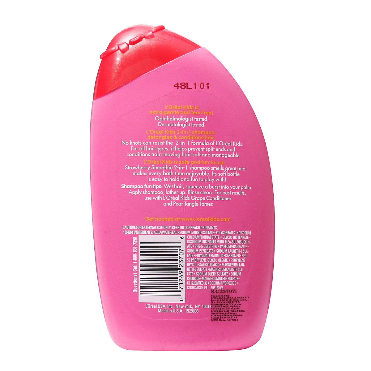 L'Oreal Kids 2-in-1 strawberry smoothie label close-up highlighting scent and paraben-free formula.