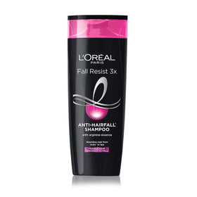 L'Oreal Paris Fall Repair 3X shampoo bottle on a bathroom shelf for daily cleansing.