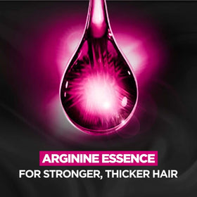 L'Oreal Paris Fall Repair 3X shampoo poured into palm for easy application.